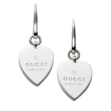 gucci earrings heart silver|Gucci silver dangling earrings.